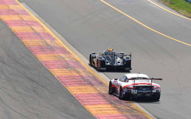 Mustang Sampling Racing Cadillac DPi leads the Porsche GT Team 911 GT RSR